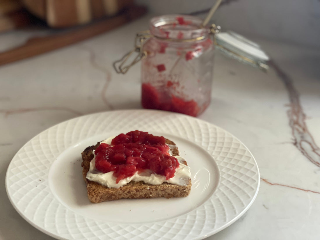 Honey roasted strawberry rhubarb sauce on mascarpone cheese spread on sprouted grain bread