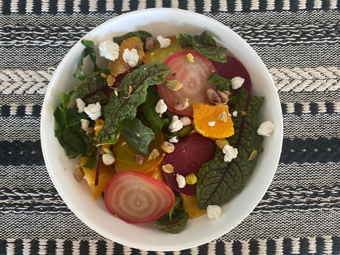 Roasted beet salad with oranges and goat cheese and roasted garlic balsamic vinaigrette